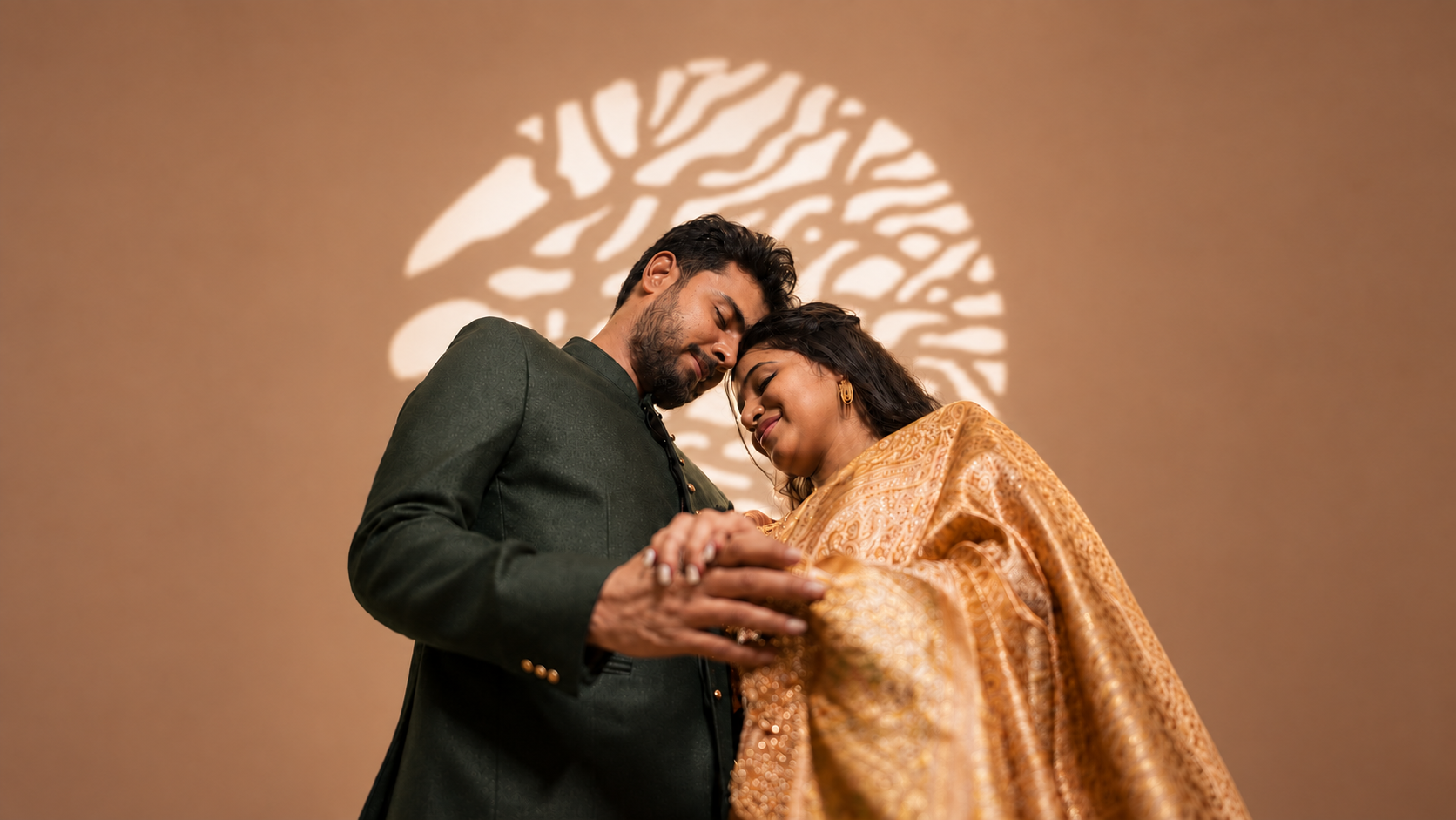 Couple leaning together in a warm golden portrait