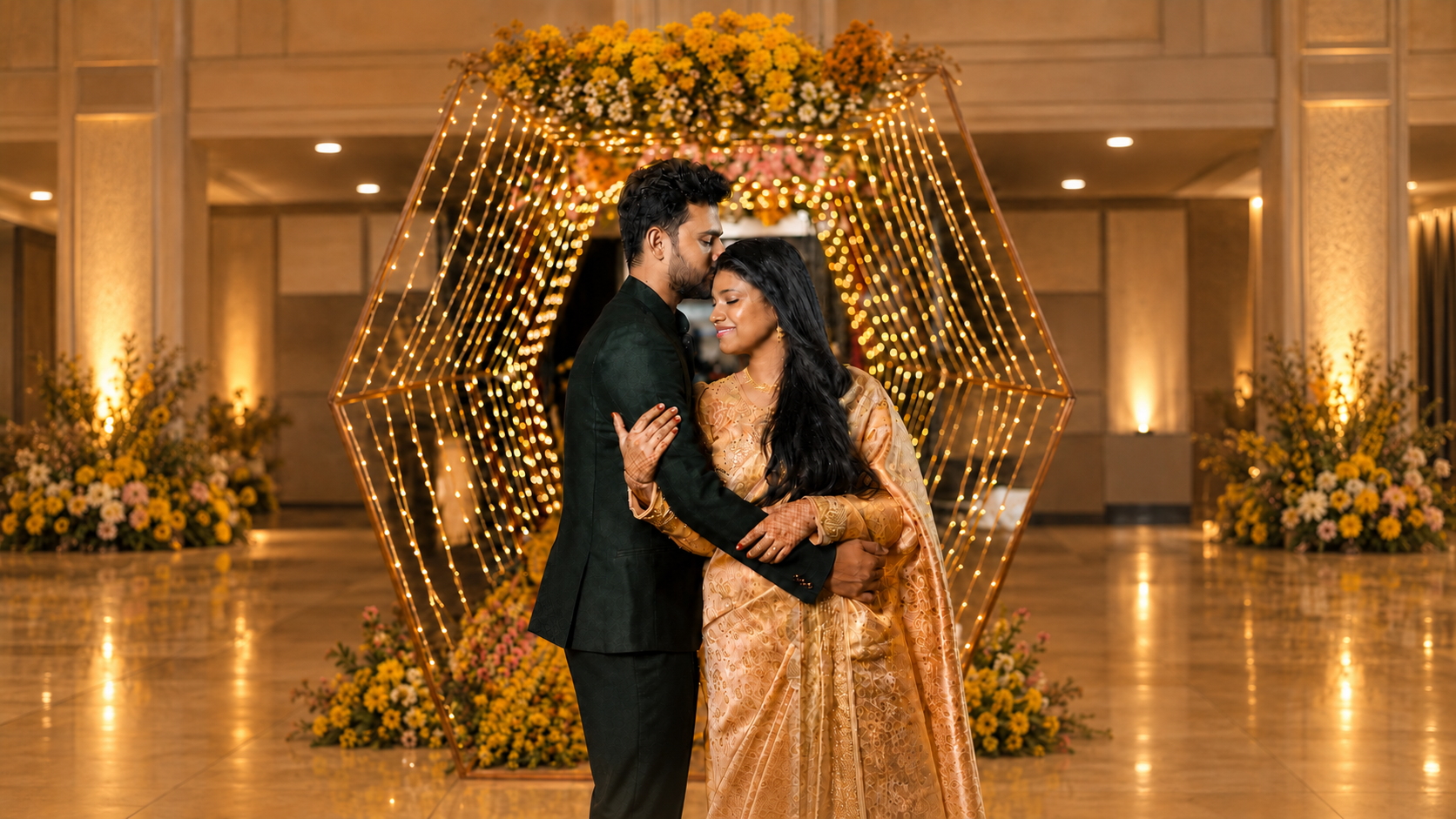Couple beneath glowing lights at their wedding venue